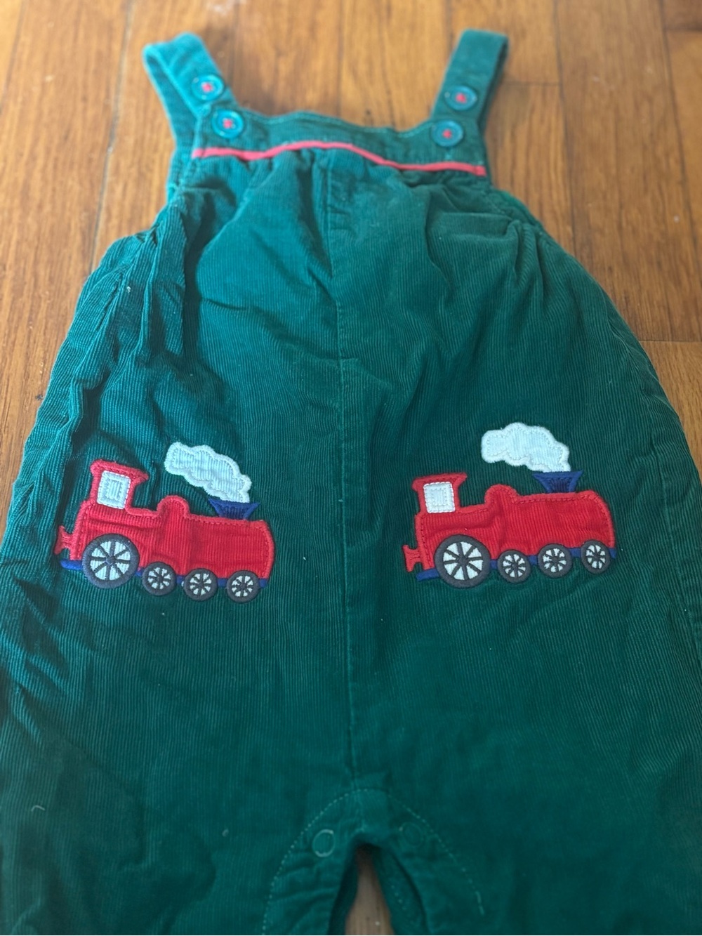 Baby Boden Green Corduroy Overalls with Red Train Appliqués